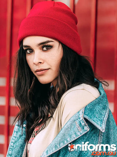 Red knit beanie from Winning Spirit Roll, ch28 roll-up acrylic beanie style