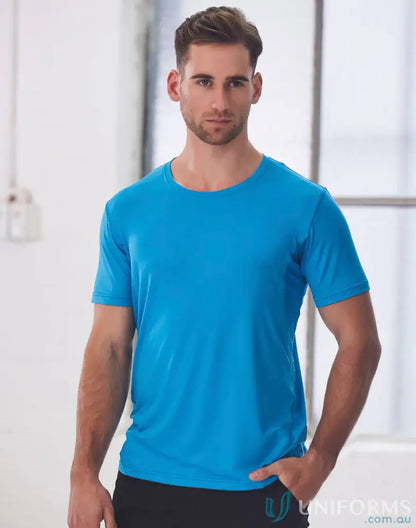 Man wearing Rotator Sports Tee in blue with cooldry® functions and breathable mesh