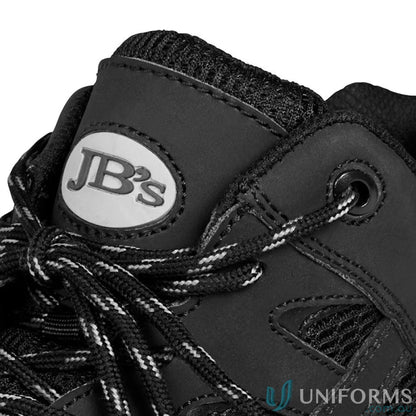 Close-up of BLACK Safety Sports Shoe with JB’s logo, mesh accents, and striped laces