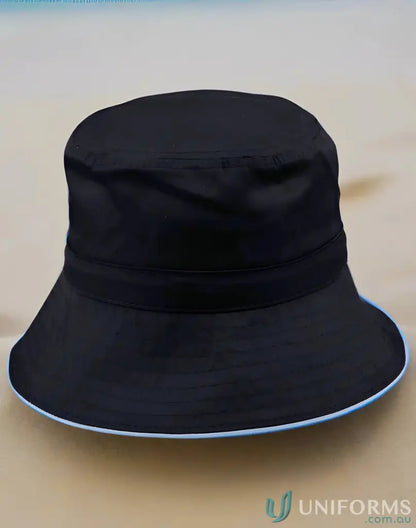 Black bucket hat with light blue trim from H1033 Sandwich Bucket for winning spirit and sun protection