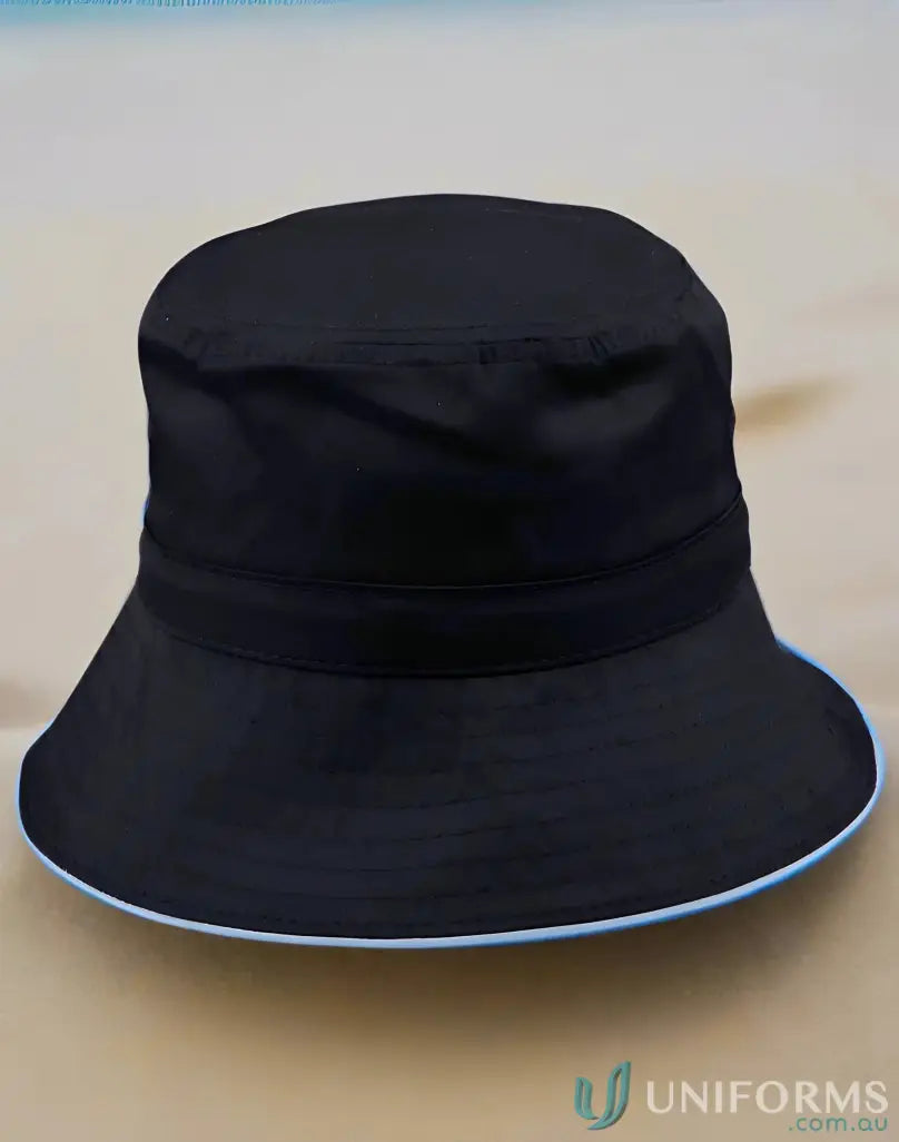 Black bucket hat with light blue trim from H1033 Sandwich Bucket for winning spirit and sun protection