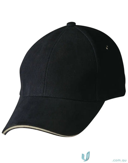 Sandwich Peak Cap featuring a black design with white trim and tuck-in fabric strap
