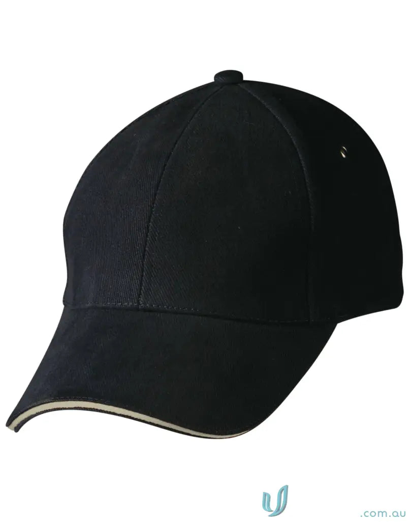 Sandwich Peak Cap featuring a black design with white trim and tuck-in fabric strap