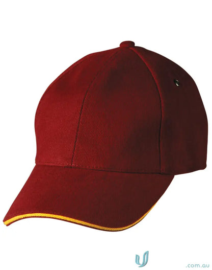 Sandwich Peak Cap with maroon color, yellow trim, and tuck-in fabric strap for winning spirit