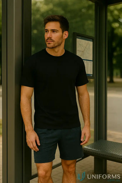 Man modeling TS37 Savvy Tee with twin stitching and winning spirit vibe