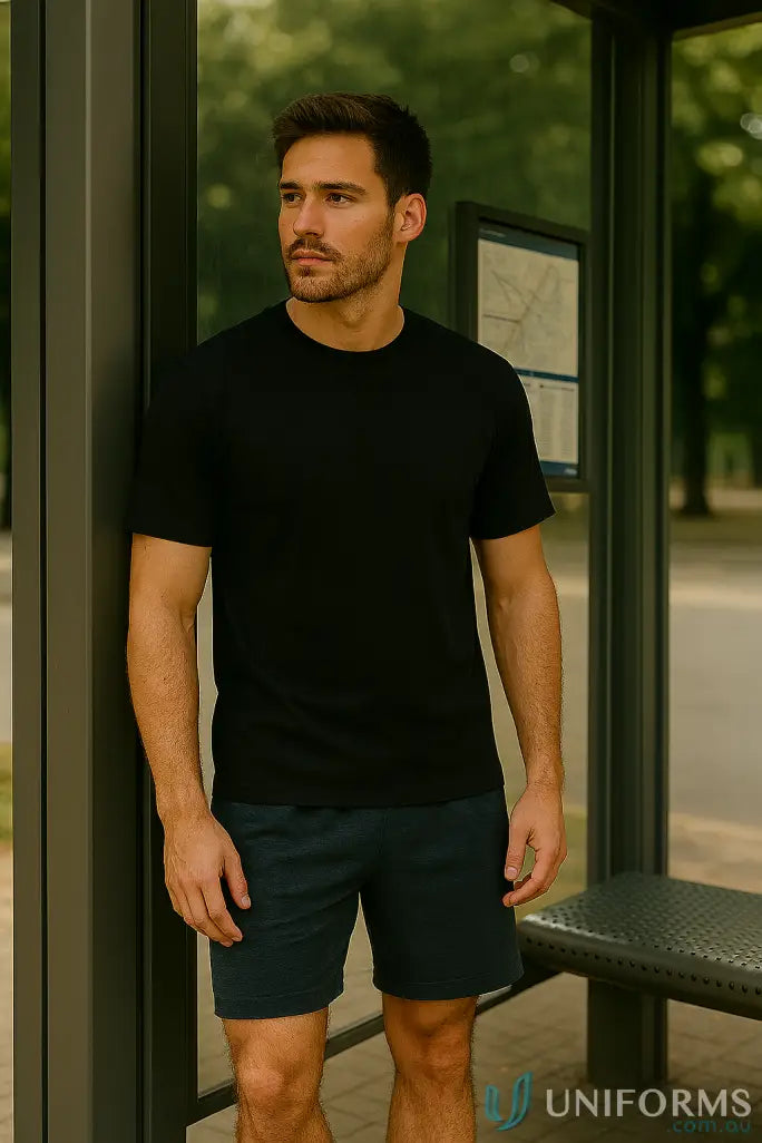 Man modeling TS37 Savvy Tee with twin stitching and winning spirit vibe