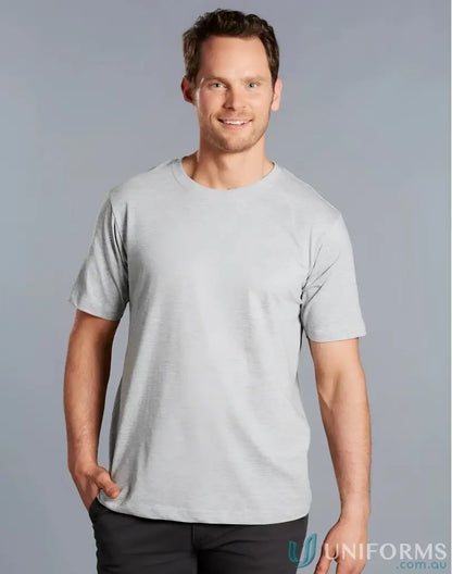 Smiling man in TS37 Savvy Tee with twin stitching, showing winning spirit style