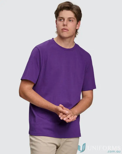 Young man in ts37 Savvy Tee with twin stitching and winning spirit look