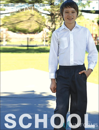 Young boy in white collared shirt and dark school trousers for school uniforms