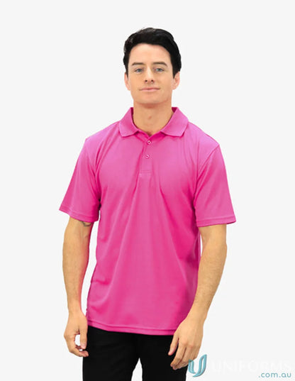 Man in pink Polo shirt with CoolDry technology for moisture management and comfort
