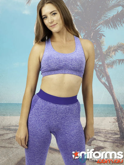 Woman in purple ladies size seamless crop top with four-way stretch for workout uniforms