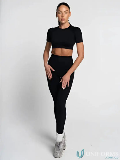Black athletic crop top and leggings set perfect for active uniforms or workwear