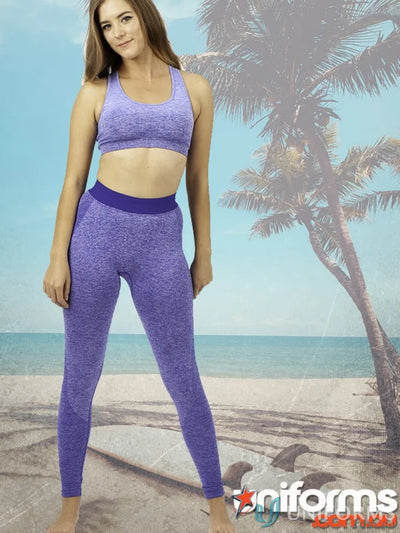 Purple athletic set ladies size seamless leggings with four-way stretch for workout magic