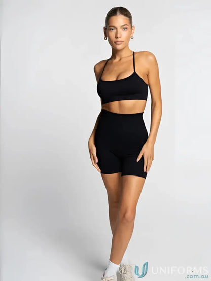 Black athletic set with flattering scoop neckline from Seamless Onyx Active Crop