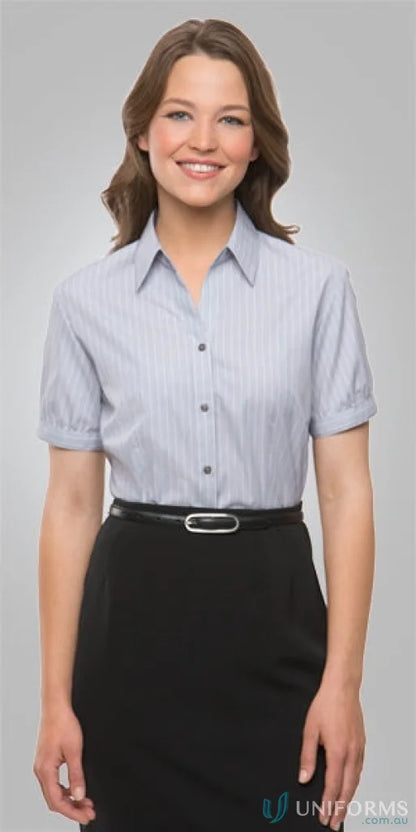 Professional woman in shadow stripe cap sleeve shirt perfect for uniforms and business