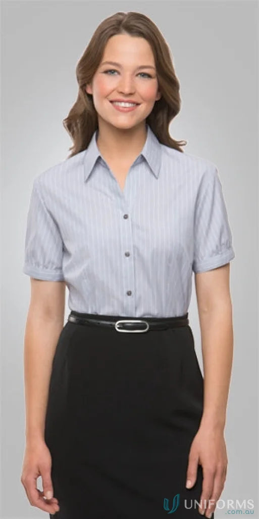 Professional woman in shadow stripe cap sleeve shirt perfect for uniforms and business