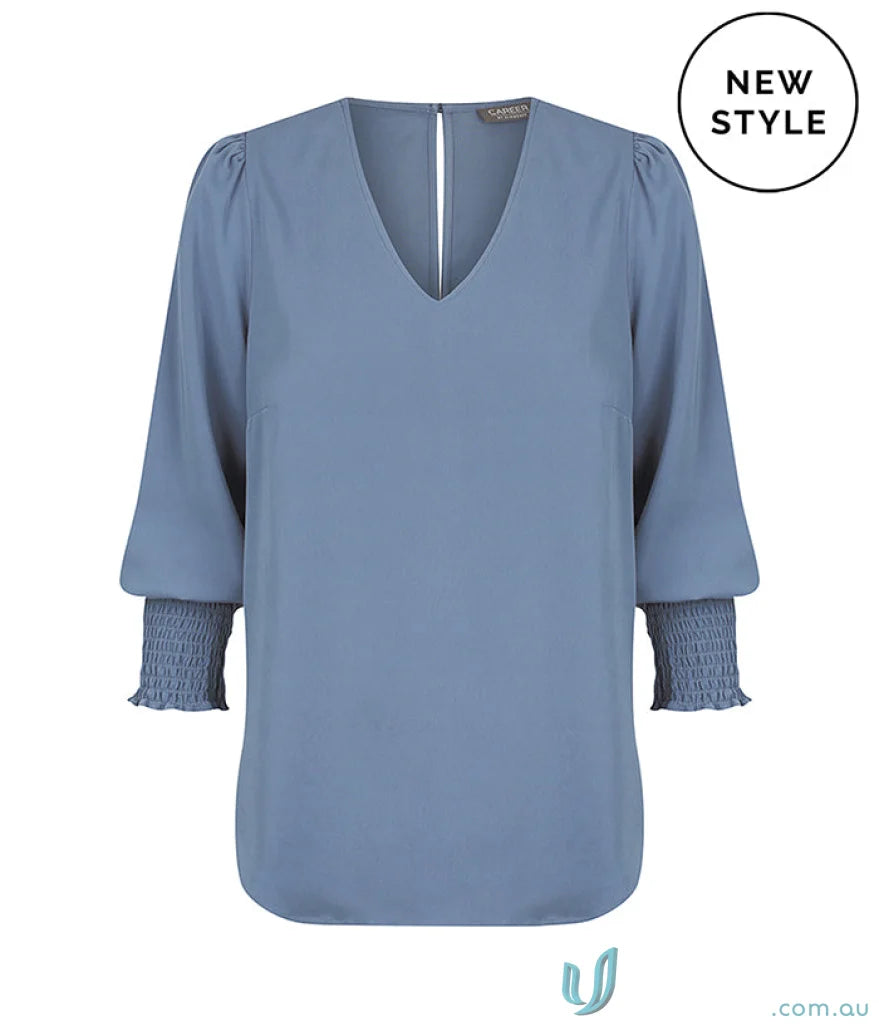Blue V-neck blouse with neck shirred cuff for a stylish look in the Shirred Cuff Top