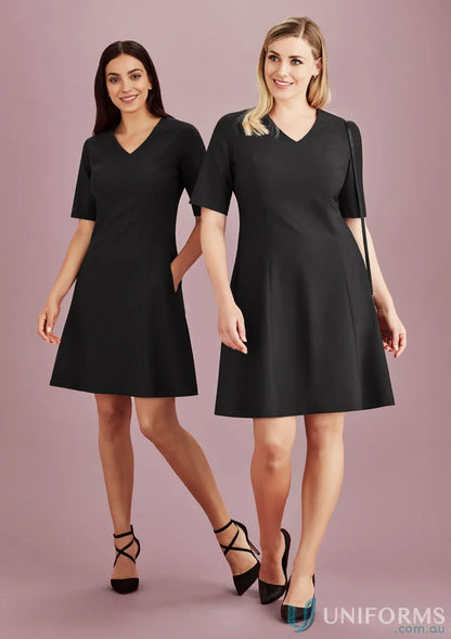 Two women wearing black Siena Extended Short Sleeve Dresses, stylish and comfy look