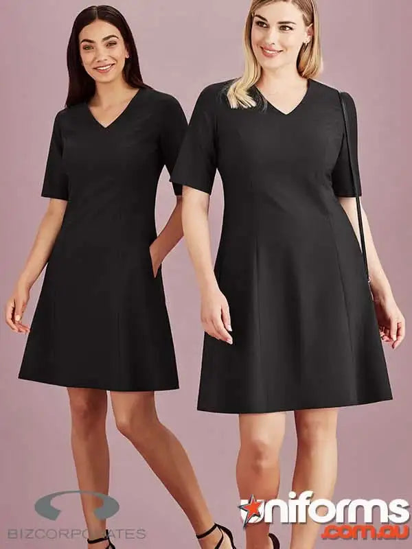 Two black Siena Extended short sleeve dresses displayed on a rack