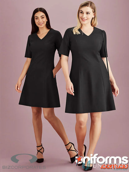 Two women wearing stylish black Siena Extended short sleeve dress looks perfect for summer