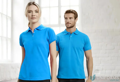 Two people wearing blue Sorrento Polo shirts from Biz Collection men’s neon short sleeve polo line