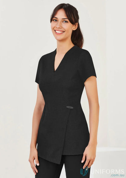 Black V-neck Spa Tunic with asymmetrical closure, perfect for women’s spa wear and Biz Collection women’s style