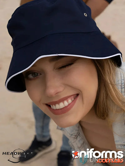 Navy sports twill bucket hat with white trim for casual style and sun protection
