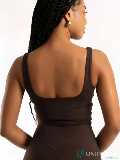 Brown athletic top with square neck tank design and shelf bra for gym wear