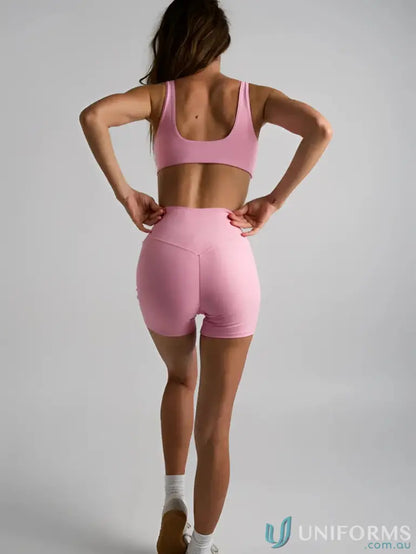 Pink athletic shorts and top with square neck design from the Square Neck Pink Crop collection