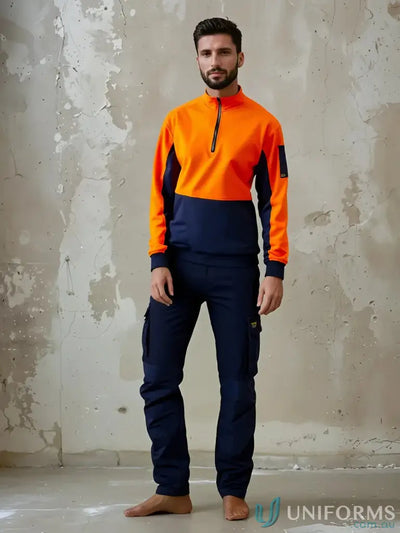 Man in orange and navy Stretch Cargo Pants with cargo pockets, perfect workwear uniforms