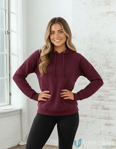 Smiling woman in SubZero Youth Hoodie warm hug fleece maroon hoodie and black leggings