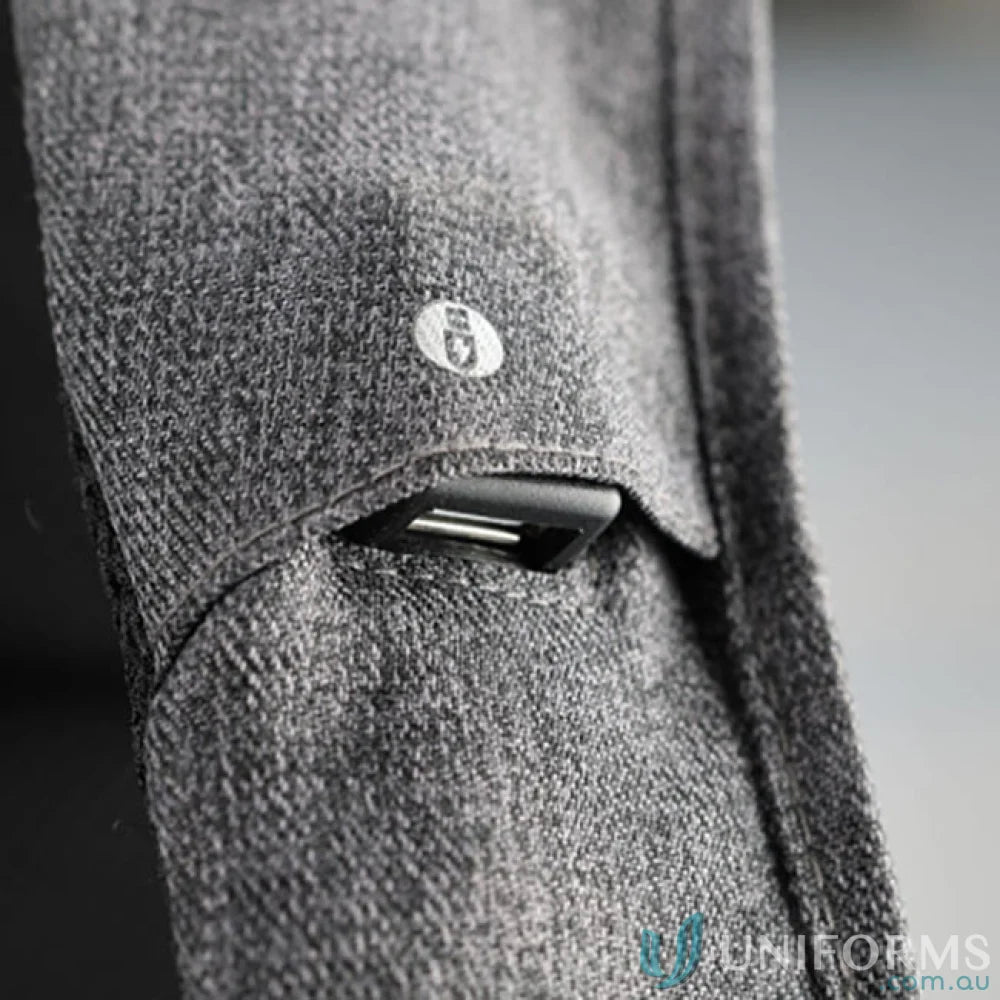 Gray herringbone fabric with black buckle on Swissdigital Cosmo 3.0 Backpack for workwear