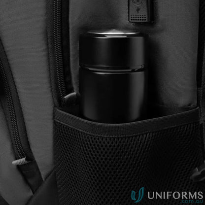 Black cylindrical container in mesh pocket of Swissdigital Vector Backpack for work uniforms