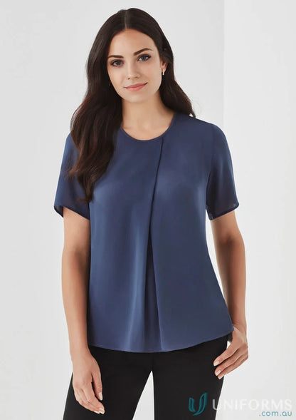 Woman wearing a Blue Sydney Top with RT065LS, perfect for everyday elegance