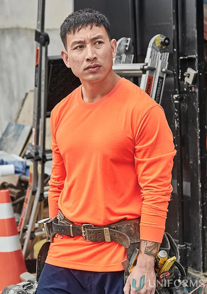 Man in orange vis long sleeve workwear shirt from Syzmic Hi Vis LS Tee