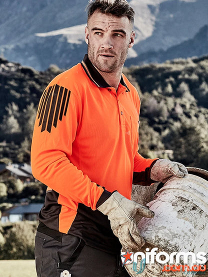 Man in orange Syzmik men’s flux long sleeve Polo Zh310 from Syzmic HiVis Flux LS Polo