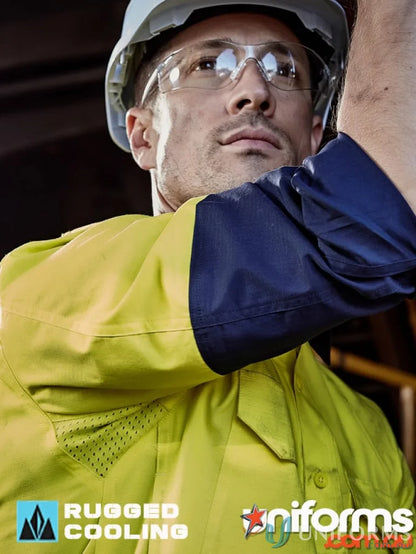 Construction worker in safety gear wearing Syzmik Men’s Rugged Cooling Vis Shirt ZW128 highlighting stress points