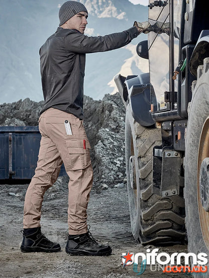 Man wearing Syzmik Streetworx men’s curved cargo pants for workwear style