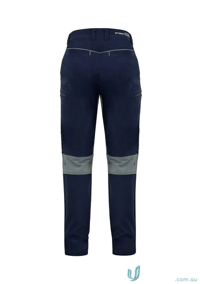 Navy blue Syzmik Men’s Streetworx stretch pants with gray knee patches, modern slim fit
