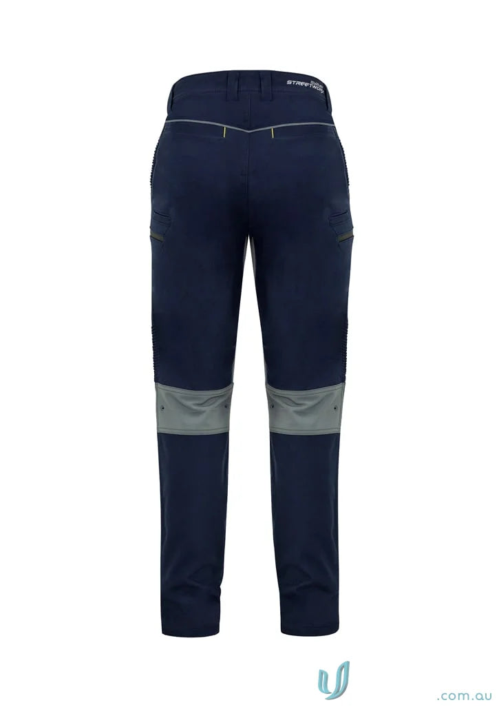 Navy blue Syzmik Men’s Streetworx stretch pants with gray knee patches, modern slim fit