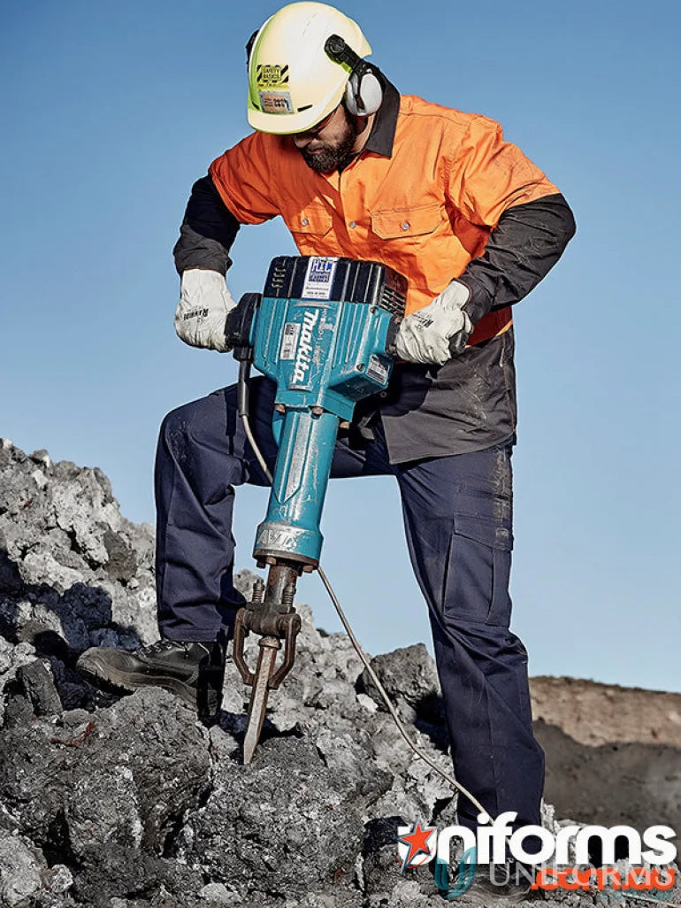 Man using jackhammer in Syzmik Men’s Cargo Pants ZP501 with reinforced stress points