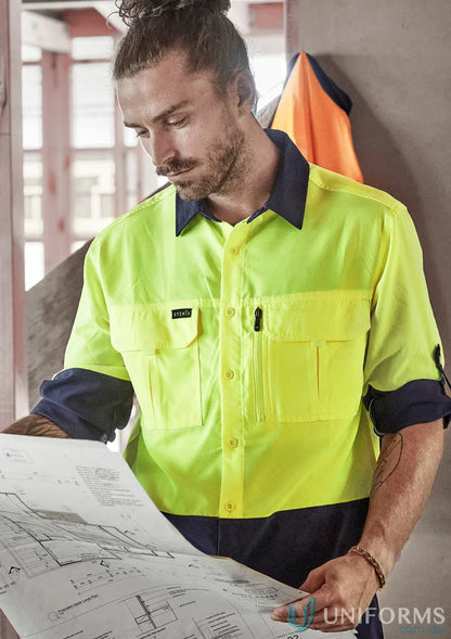 Man in Syzmik HIVIS outdoor long sleeve shirt with ripstop fabric for sun protection