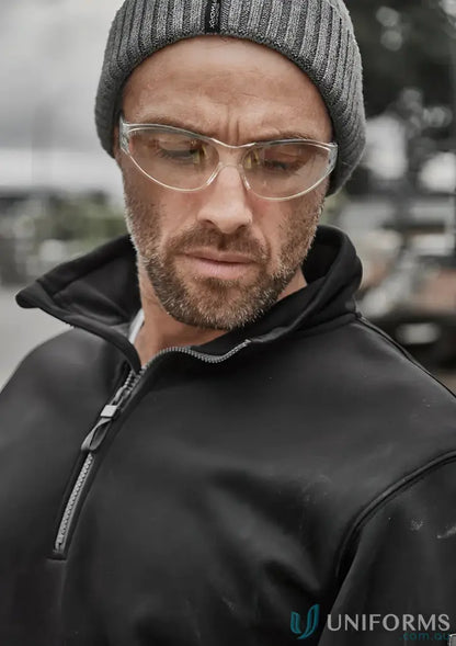 Man in safety glasses and beanie wearing Syzmik Unisex Streetworx Water Resistant Pullover