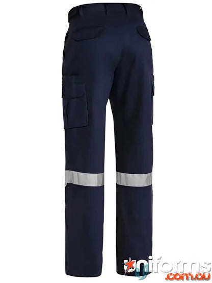 Navy blue work pants with reflective stripes, secure storage, touch tape flaps, and welt pockets