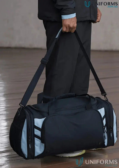 Black and light blue Tasman Sports Bag perfect for uniforms or workwear storage