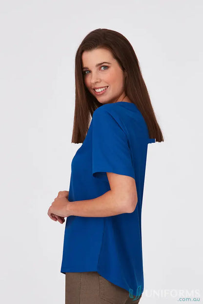 Woman in blue woven short sleeve from City Collection Knit for a casual look