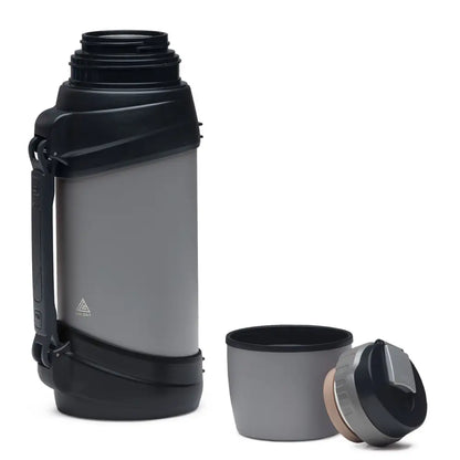 ToughTank 2.0L double walled stainless steel vacuum insulated thermos with black accents and handle for outdoor use
