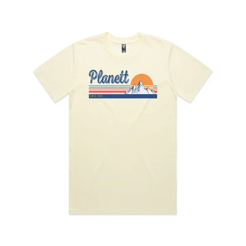 Cream-colored short-sleeved trek tee with retro planett graphic and rainbow stripes perfect for casual workwear uniforms