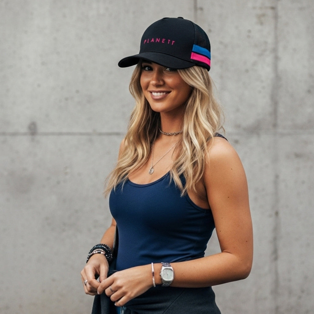 Black trucker ponytail cap with pink blue stripe and planet logo