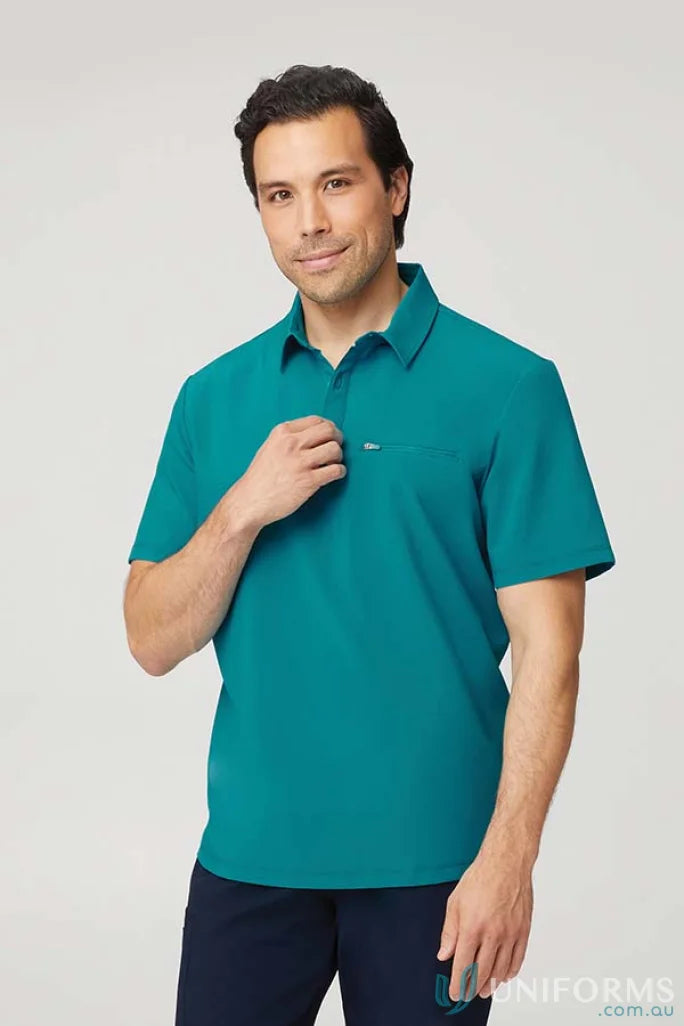 Man in teal city active stretch polo shirt, perfect for uniforms and workwear